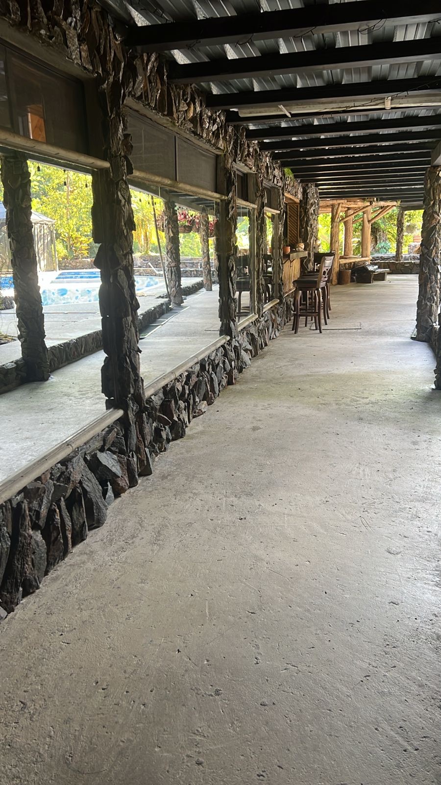 The long covered terrace and bar