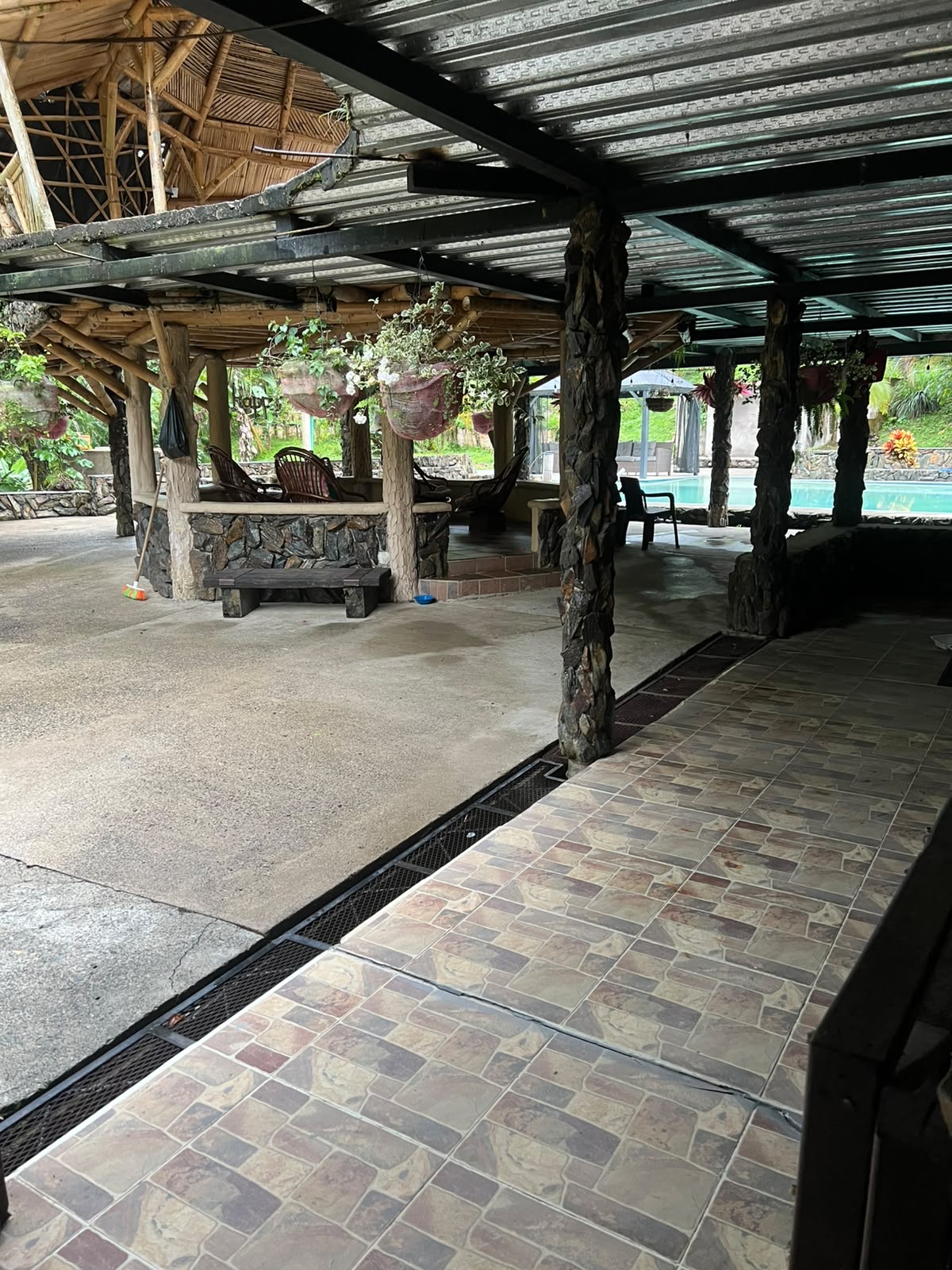 The covered terrace and bamboo pavilion by the pool